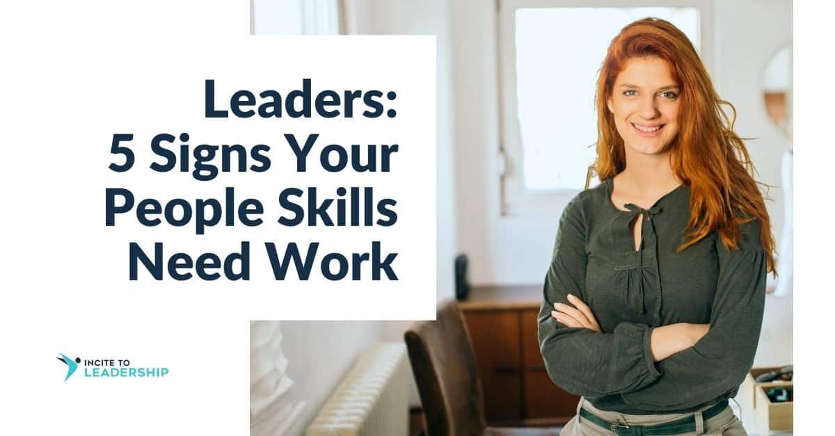 For this article by Jo Ilfeld, Executive Leadership Coach on soft skills for leaders the image shows a redheaded woman with folded arms in an office.