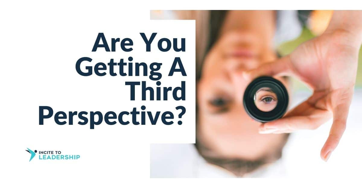 For this article by Jo Ilfeld, Executive Leadership Coach on outside perspective, the image shows a woman looking through a camera lens.