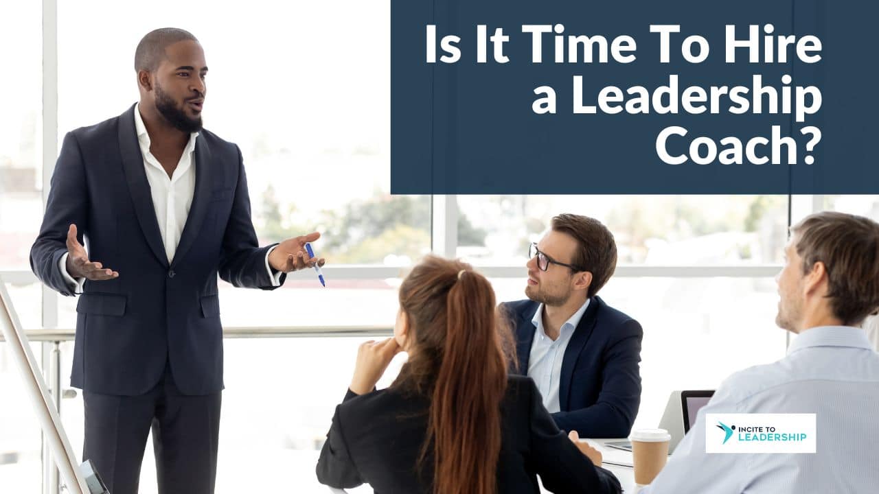 Is it time to hire a leadership coach? For this article by Jo Ilfeld, Executive Leadership Coach on leadership coaches, the image shows a business man standing in front of a meeting