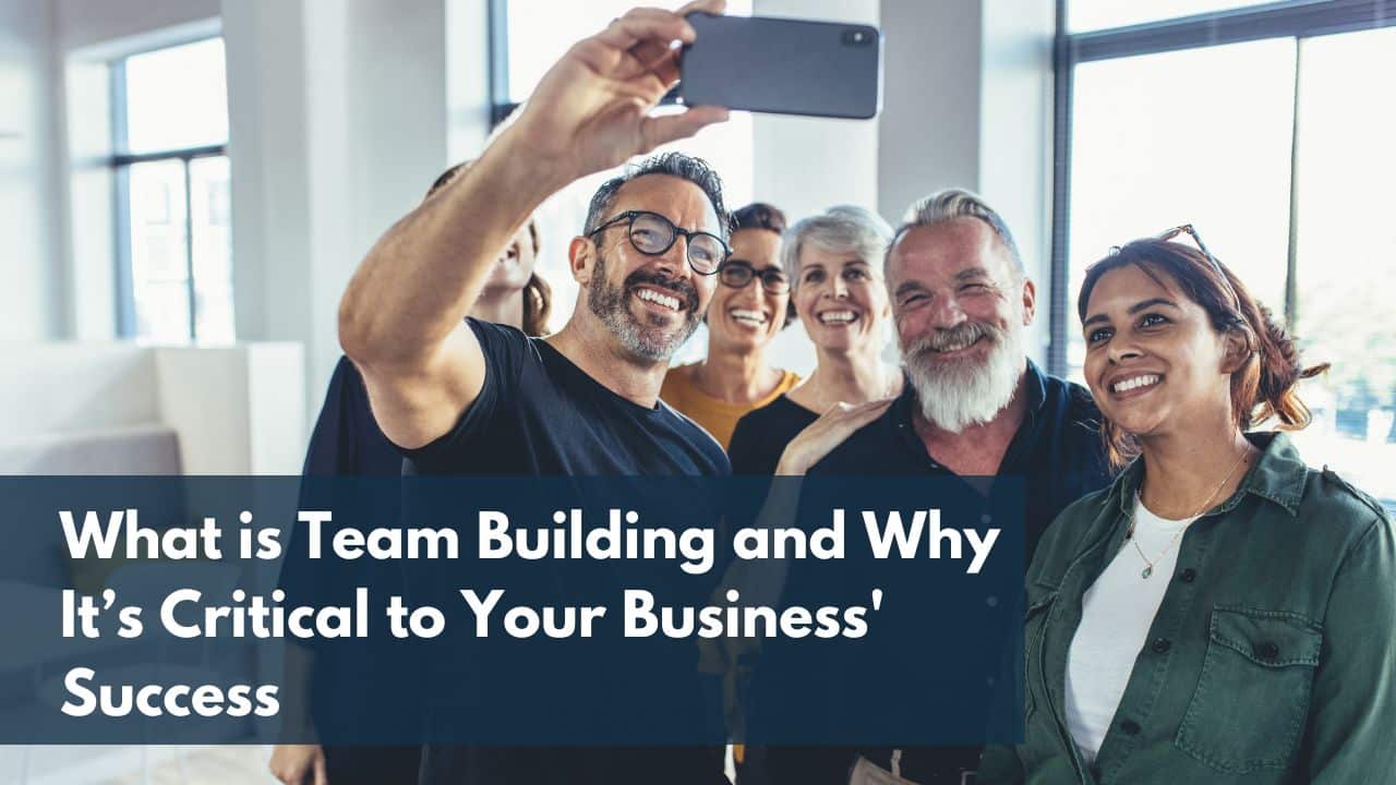 For this article by Jo Ilfeld, Executive Leadership Coach on team building, the image shows a diverse group of men and women taking a selfie.