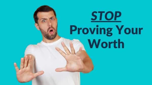 For this article by Jo Ilfeld, Executive Leadership Coach on proving your worth the image shows a young male holding out his hands to signify stop